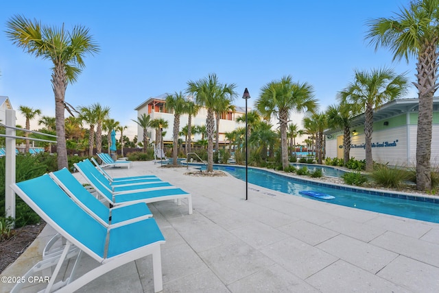 community pool featuring a patio area