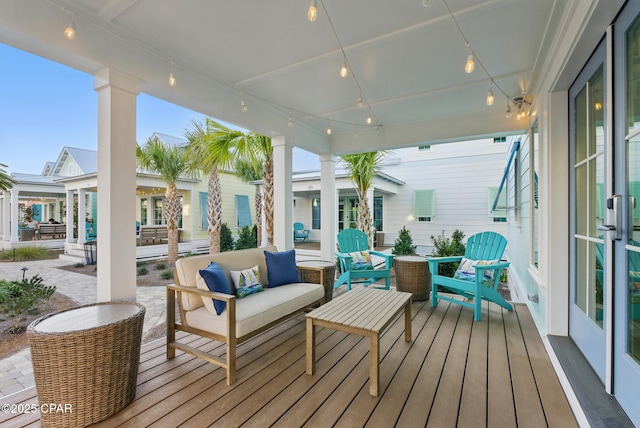 wooden deck featuring an outdoor living space