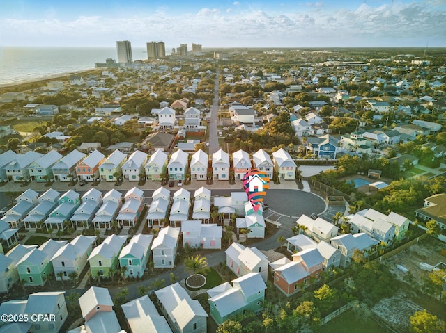 birds eye view of property featuring a residential view and a water view