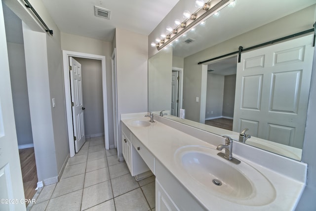 full bathroom featuring a sink, visible vents, and baseboards