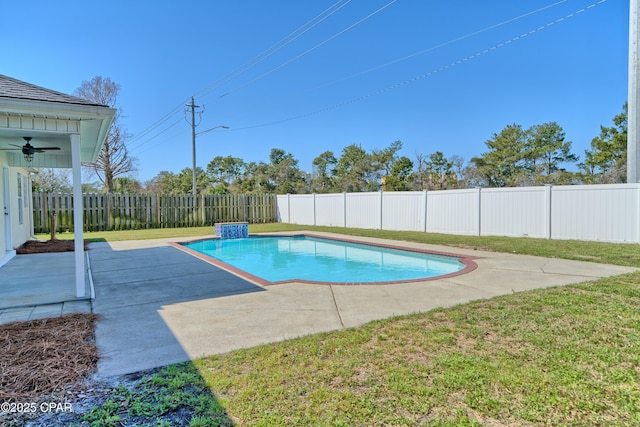 view of swimming pool with a fenced backyard, a patio area, a fenced in pool, and a yard