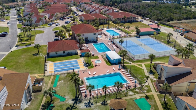 birds eye view of property with a residential view