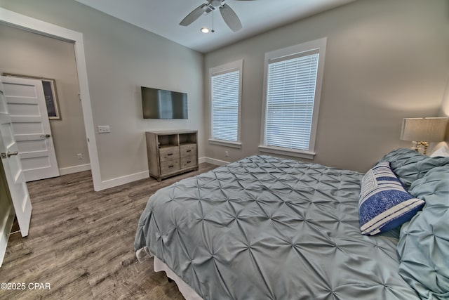 bedroom with recessed lighting, baseboards, wood finished floors, and ceiling fan