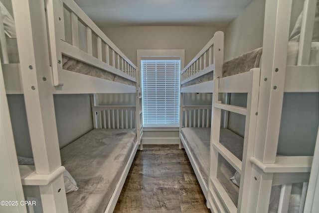 unfurnished bedroom featuring wood finished floors