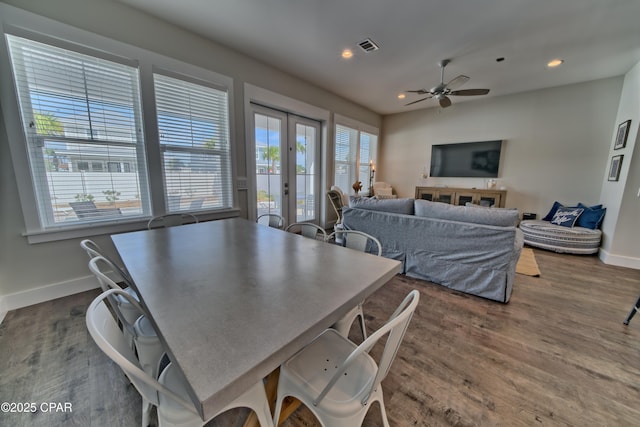 dining room with recessed lighting, french doors, baseboards, and dark wood-style flooring