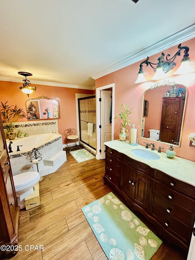 full bath with a bath, wood finished floors, a stall shower, and ornamental molding