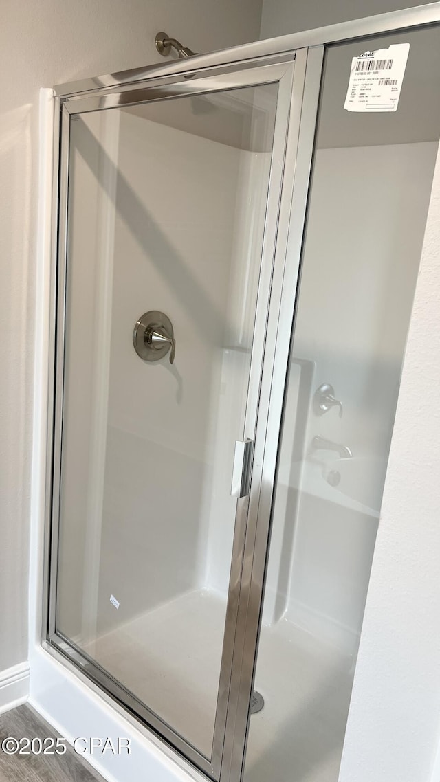 full bathroom with a shower stall