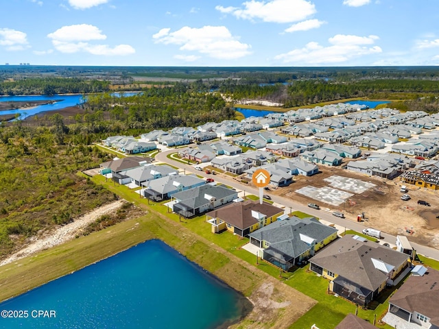 aerial view with a water view and a residential view