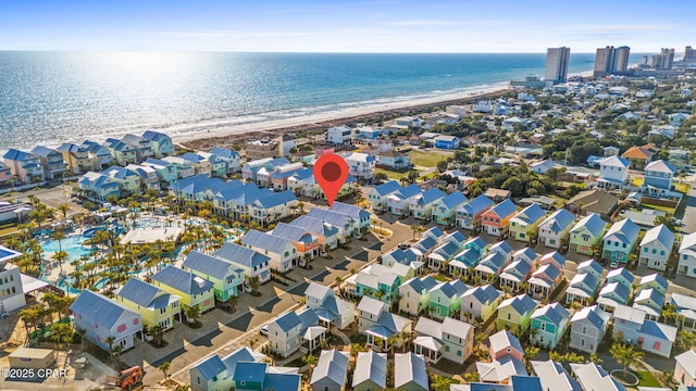 bird's eye view with a residential view and a water view