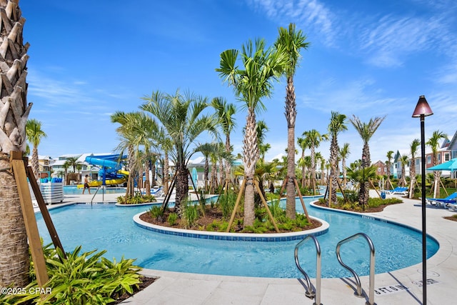 community pool with a water slide