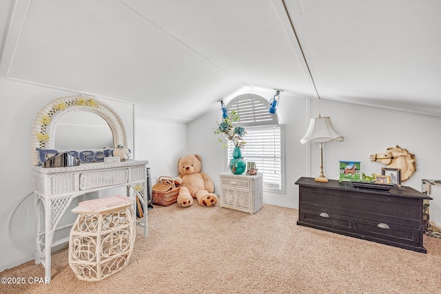 interior space featuring lofted ceiling and carpet