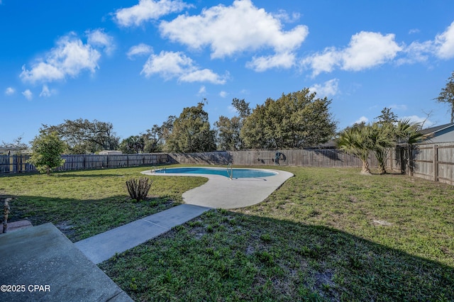 view of yard featuring a patio, a fenced backyard, and a fenced in pool