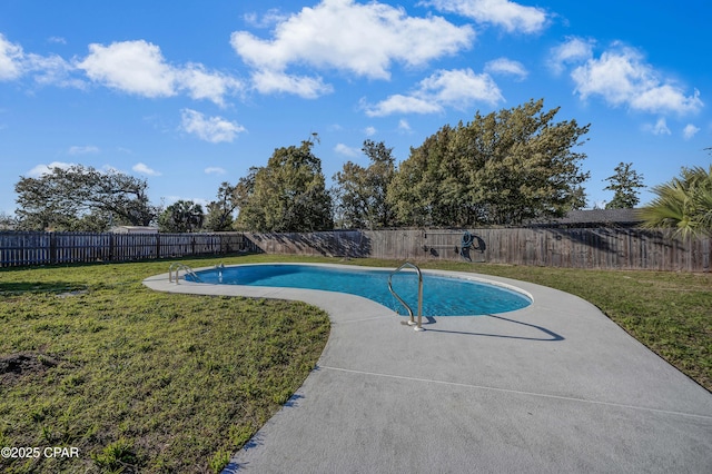 view of swimming pool featuring a fenced backyard, a fenced in pool, and a yard