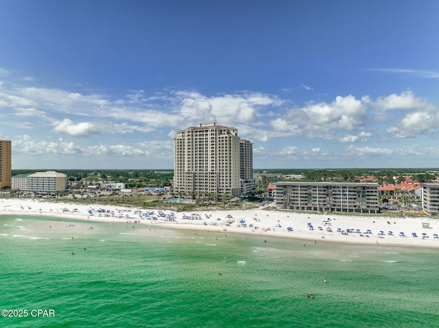 view of water feature with a view of the beach and a view of city