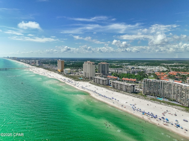 drone / aerial view with a view of city, a beach view, and a water view