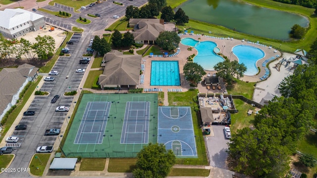 bird's eye view with a water view