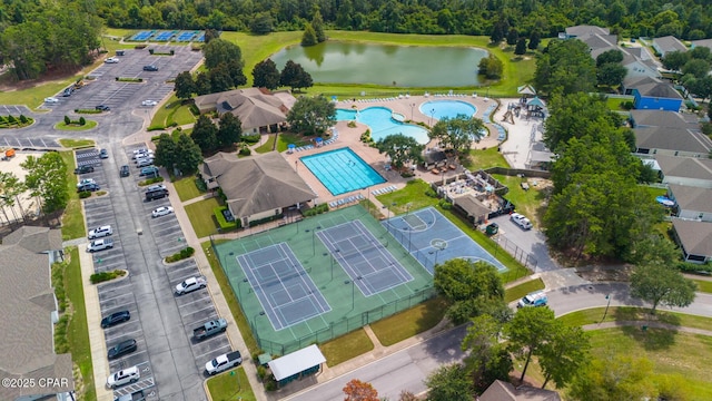 bird's eye view with a water view