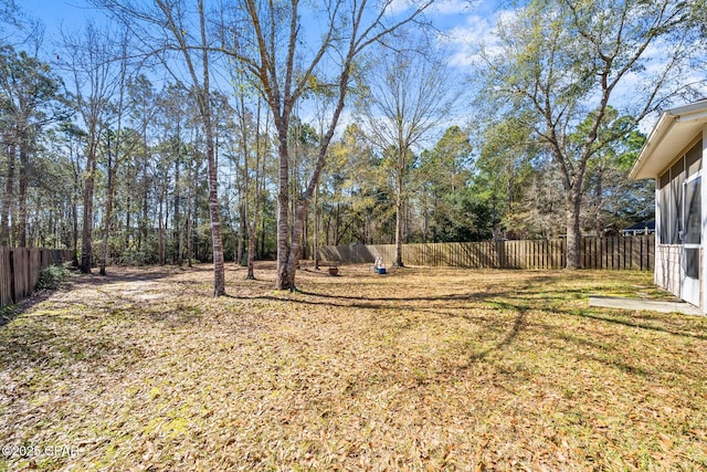 view of yard with fence