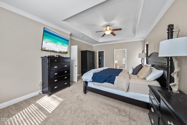 bedroom featuring baseboards, a raised ceiling, light carpet, and ornamental molding