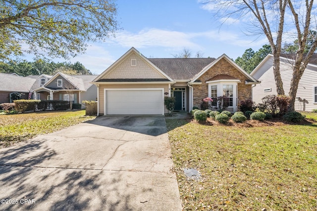 view of front of home featuring concrete driveway, a garage, stone siding, and a front lawn