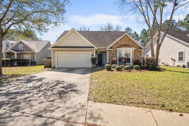 view of front of house featuring stone siding, a front lawn, an attached garage, and driveway