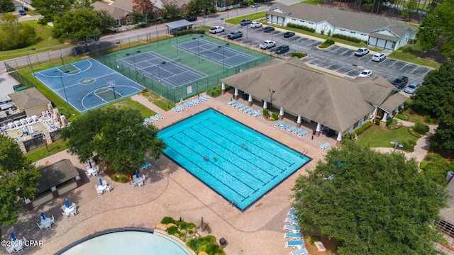 birds eye view of property with a residential view