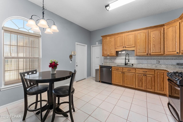 kitchen with a sink, dishwashing machine, black range with gas cooktop, and a wealth of natural light