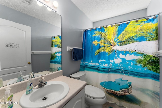 full bathroom featuring visible vents, toilet, curtained shower, a textured ceiling, and vanity