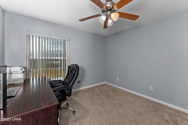 home office featuring carpet flooring, ceiling fan, a textured ceiling, and baseboards