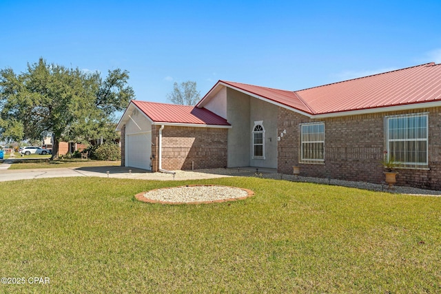 ranch-style home with brick siding, driveway, metal roof, and a garage