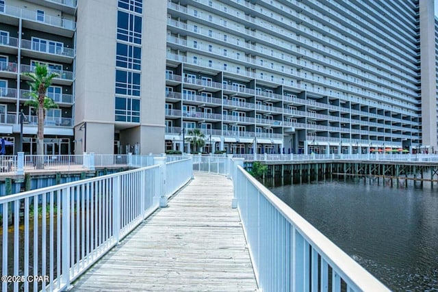 view of home's community with a water view