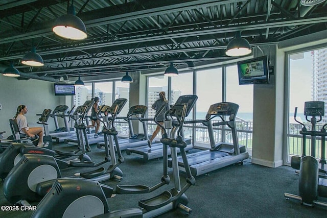 gym featuring baseboards