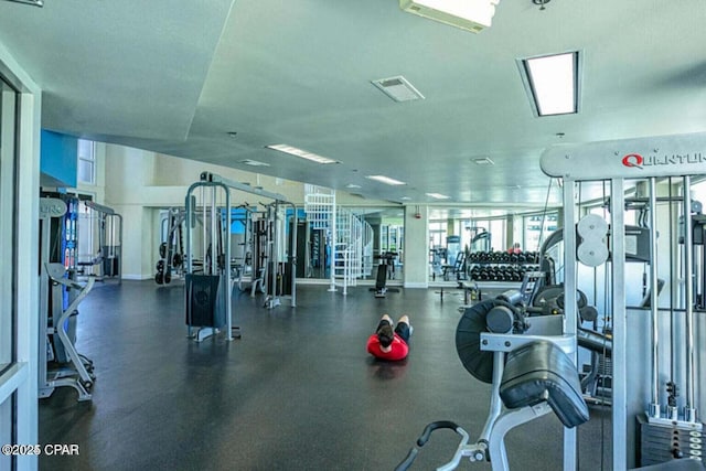exercise room featuring visible vents