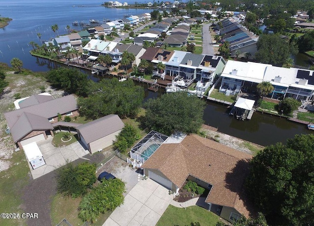 aerial view with a residential view and a water view