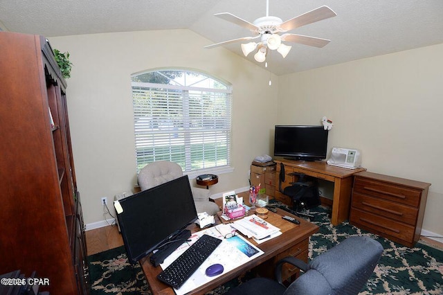 office with wood finished floors, a ceiling fan, baseboards, lofted ceiling, and a textured ceiling