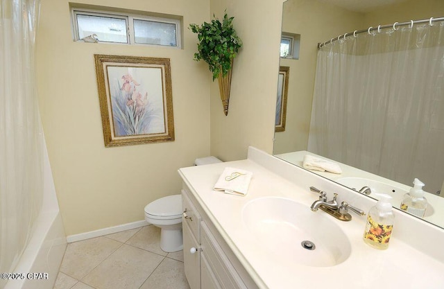 full bathroom with tile patterned floors, toilet, vanity, and baseboards