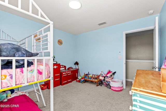 carpeted bedroom with visible vents