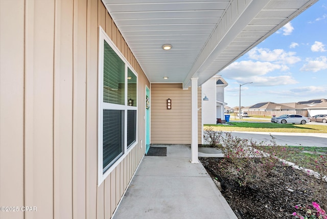 view of patio / terrace featuring a residential view and a porch