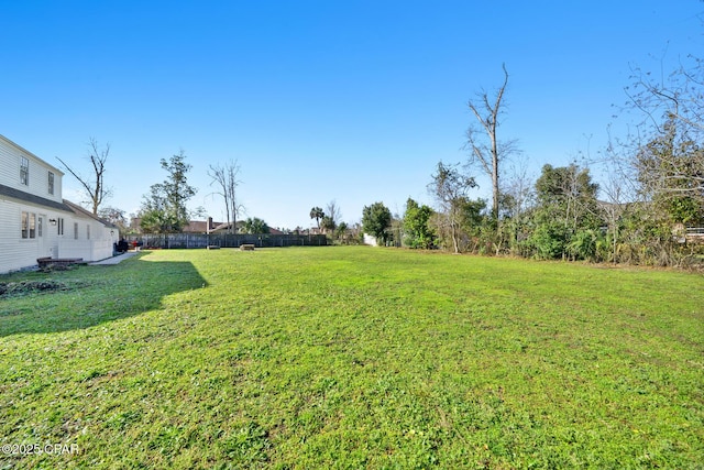 view of yard featuring fence