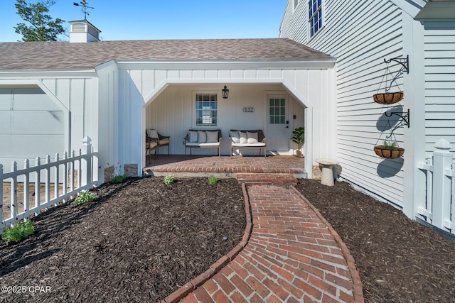 exterior space featuring fence and covered porch