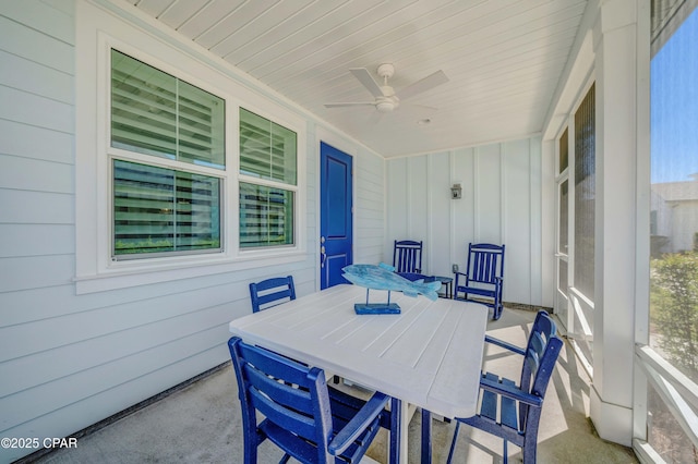 sunroom / solarium featuring wooden ceiling and a ceiling fan