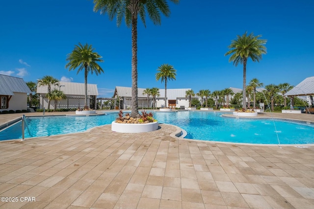 pool with a patio area