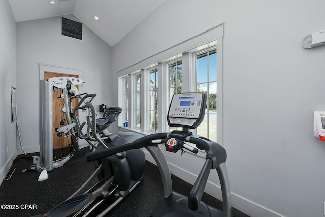 gym featuring recessed lighting, visible vents, vaulted ceiling, and baseboards