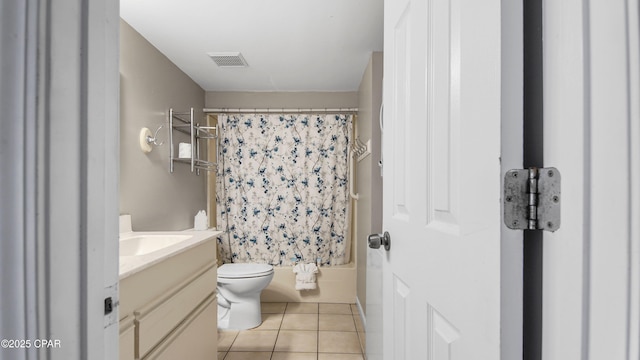 full bathroom featuring tile patterned floors, visible vents, toilet, shower / tub combo with curtain, and vanity