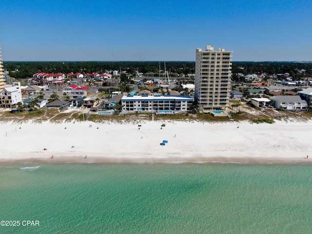 aerial view with a view of the beach and a water view