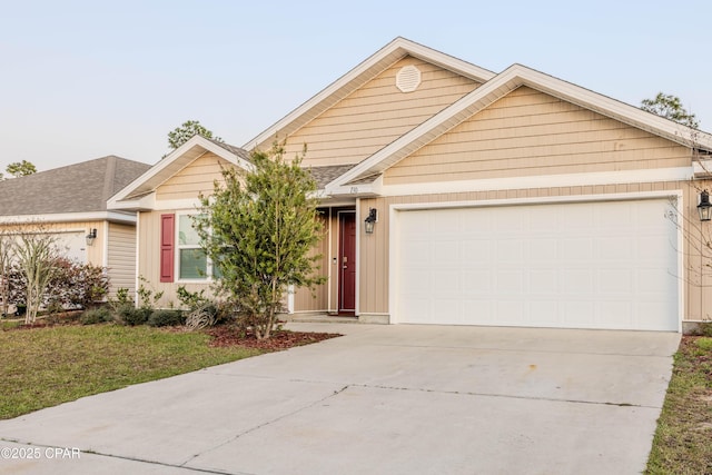 single story home with driveway, an attached garage, a front lawn, and a shingled roof