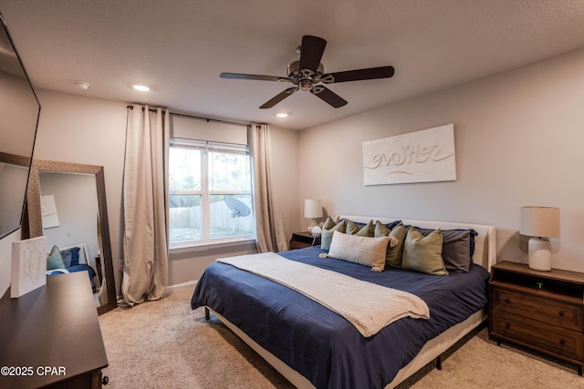 carpeted bedroom with recessed lighting, baseboards, and a ceiling fan