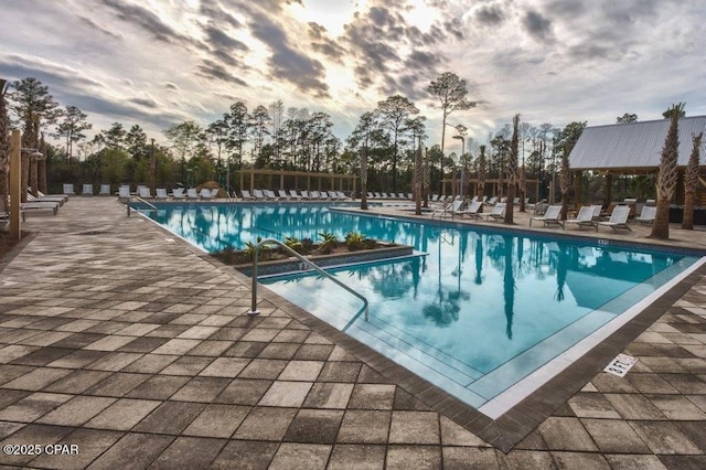 community pool featuring a patio area