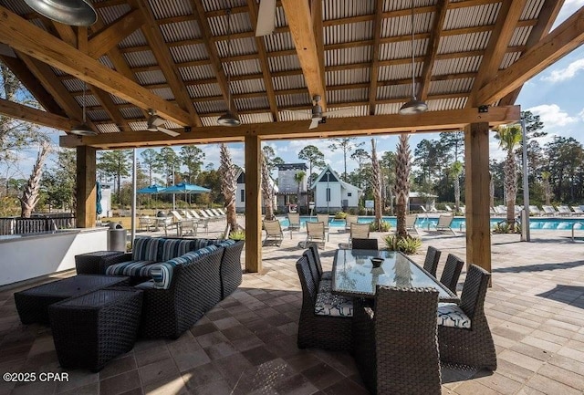 view of patio featuring a community pool