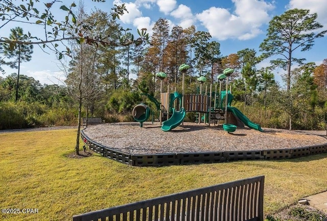 communal playground featuring a lawn